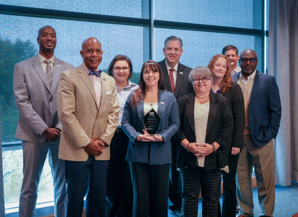PWC CEO and Board Chair Richard King are pictured with members of the PWC Communications and Community Relations team and their 2026 NC3C Excellence in Communications Award.